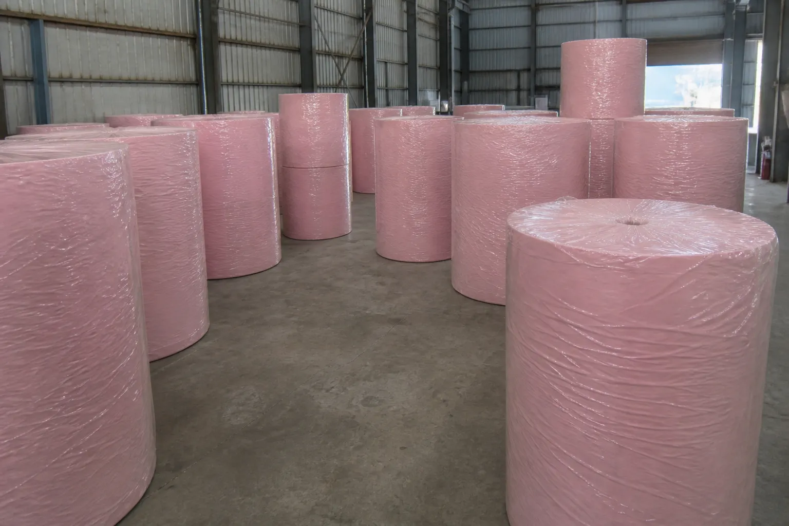 Pink colored tissue parent roll